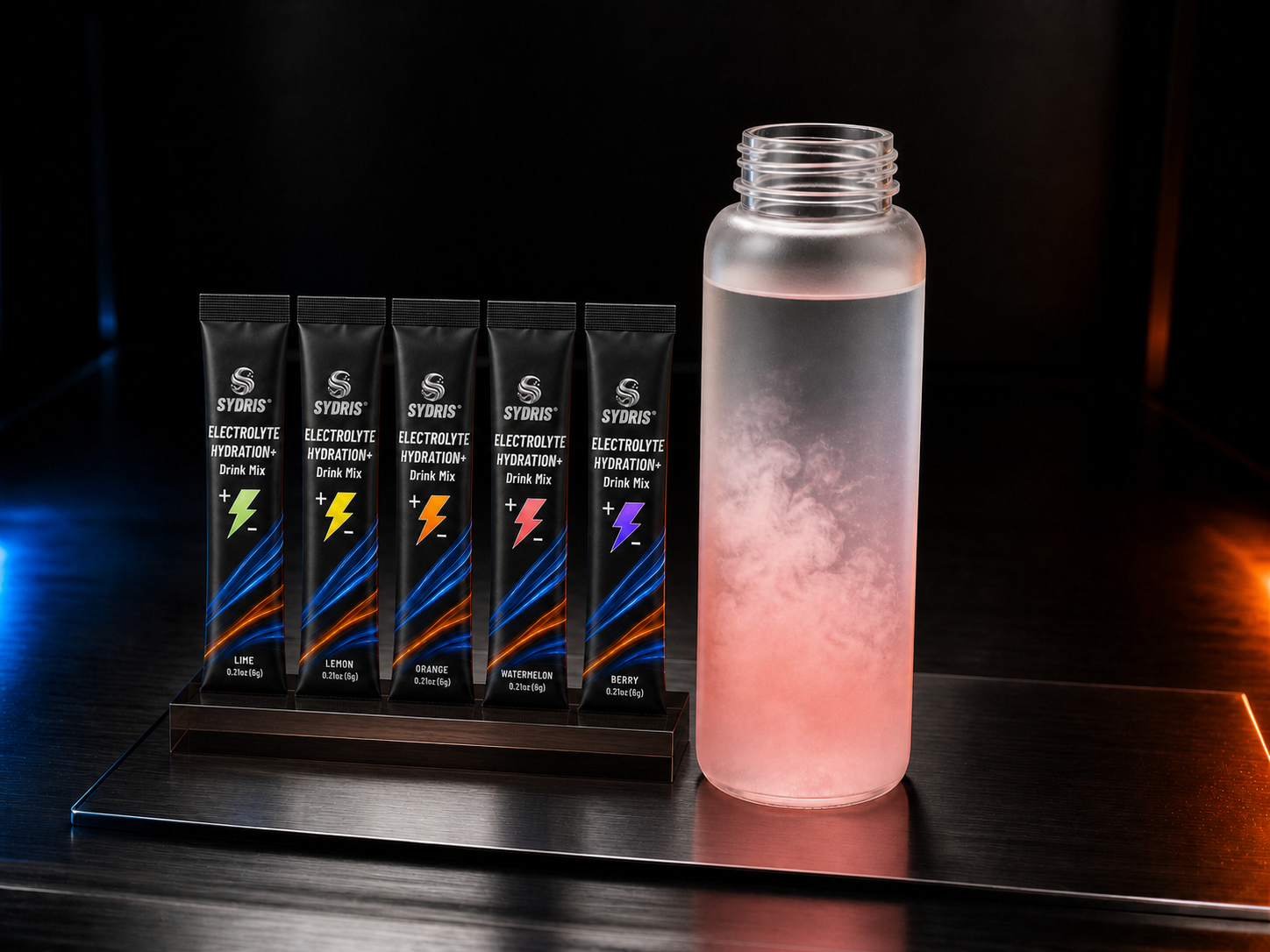 Five SYDRIS flavor sachets beside a bottle as drink mix dissolves.